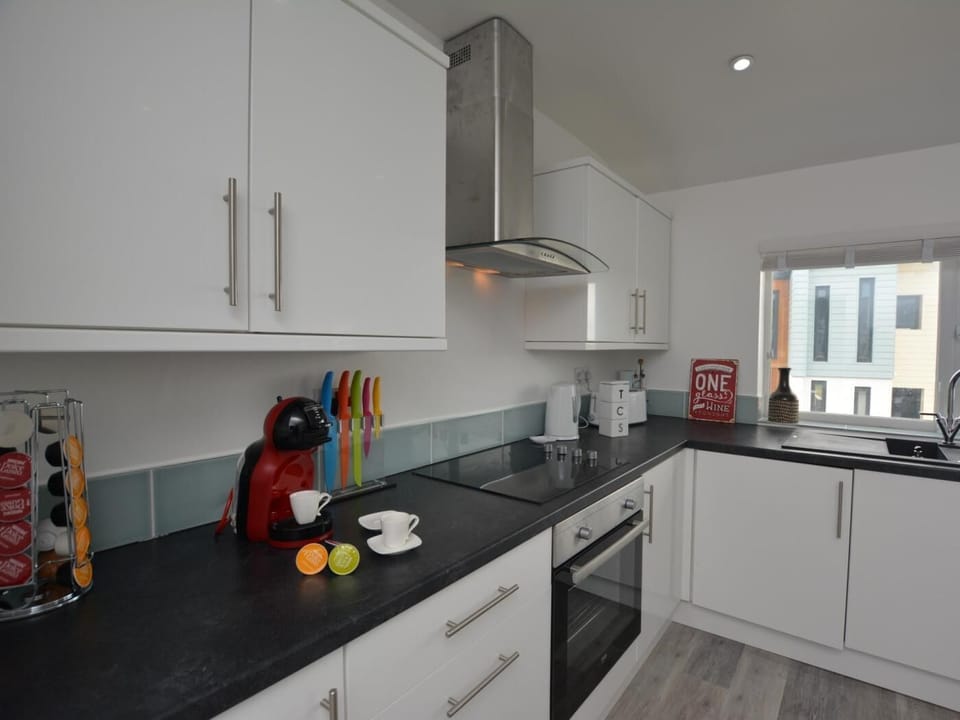 Rustle up a meal in this well-equipped kitchen on the firat floor