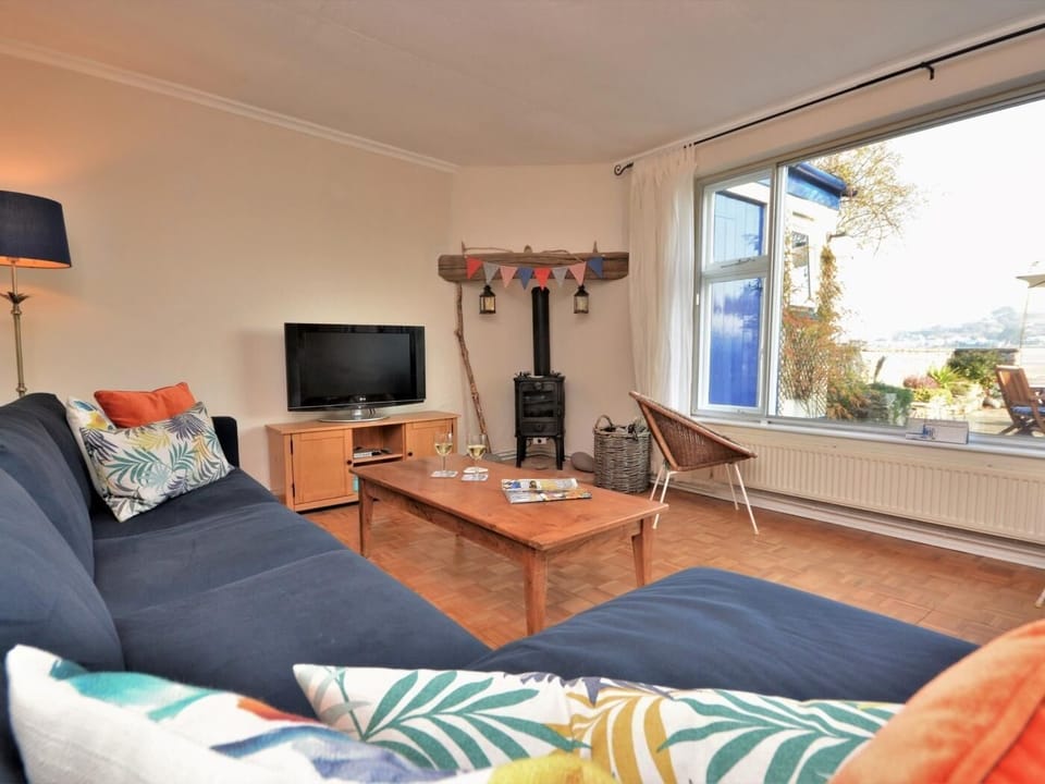 Lounge with gas effect fire and views to the estuary