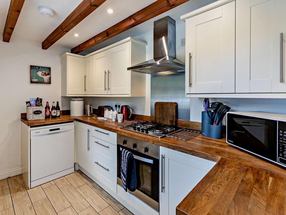 The kitchen has everything you need for your stay