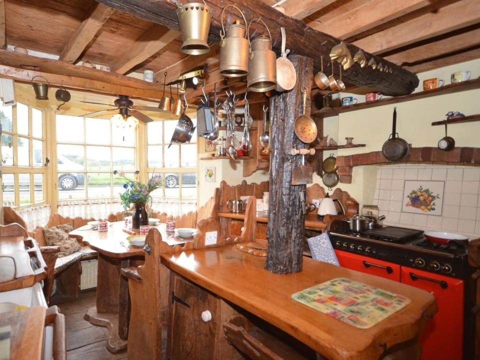 Character kitchen with hand-crafted wood units seating for 5