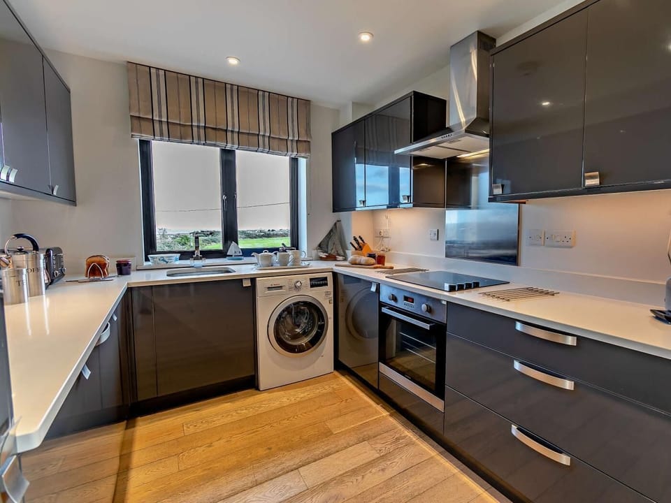 A sleek kitchen with everything you could need
