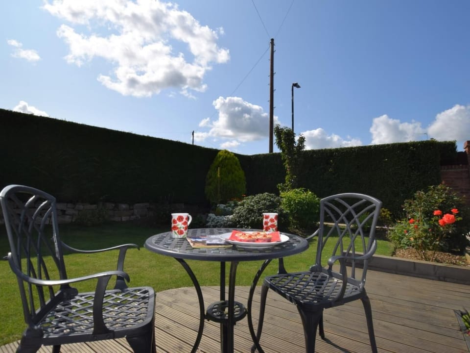 Enjoy a coffee in the front garden 