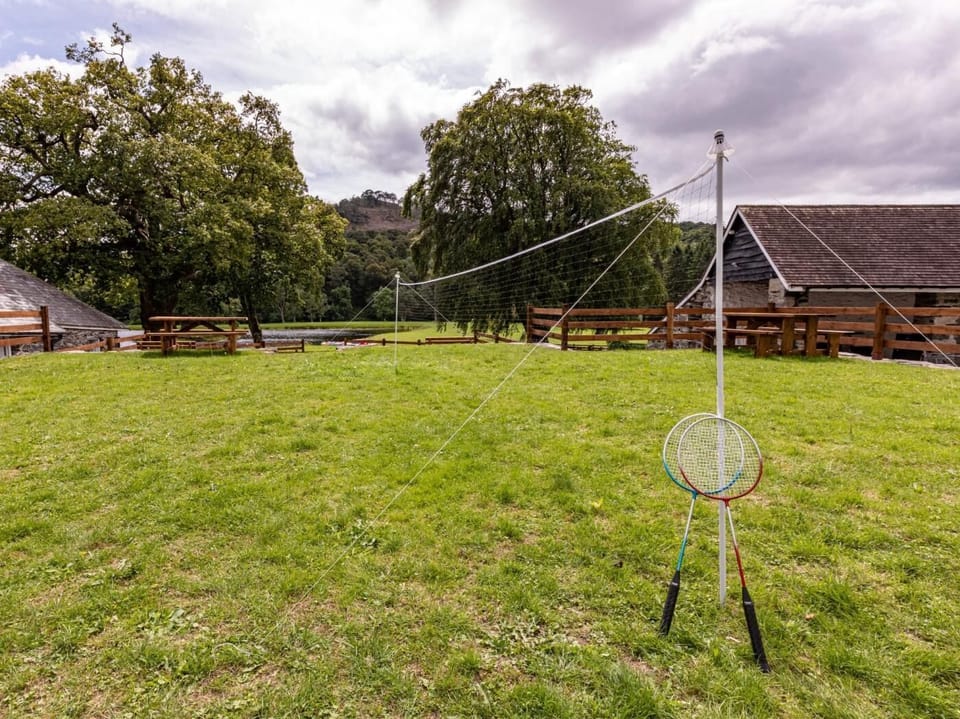 Challenge the family to a game of badminton 