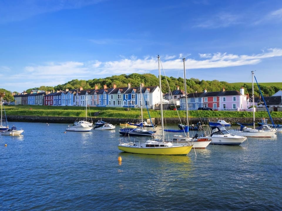 Explore Aberaeron with its harbour, independent shops, and eateries
