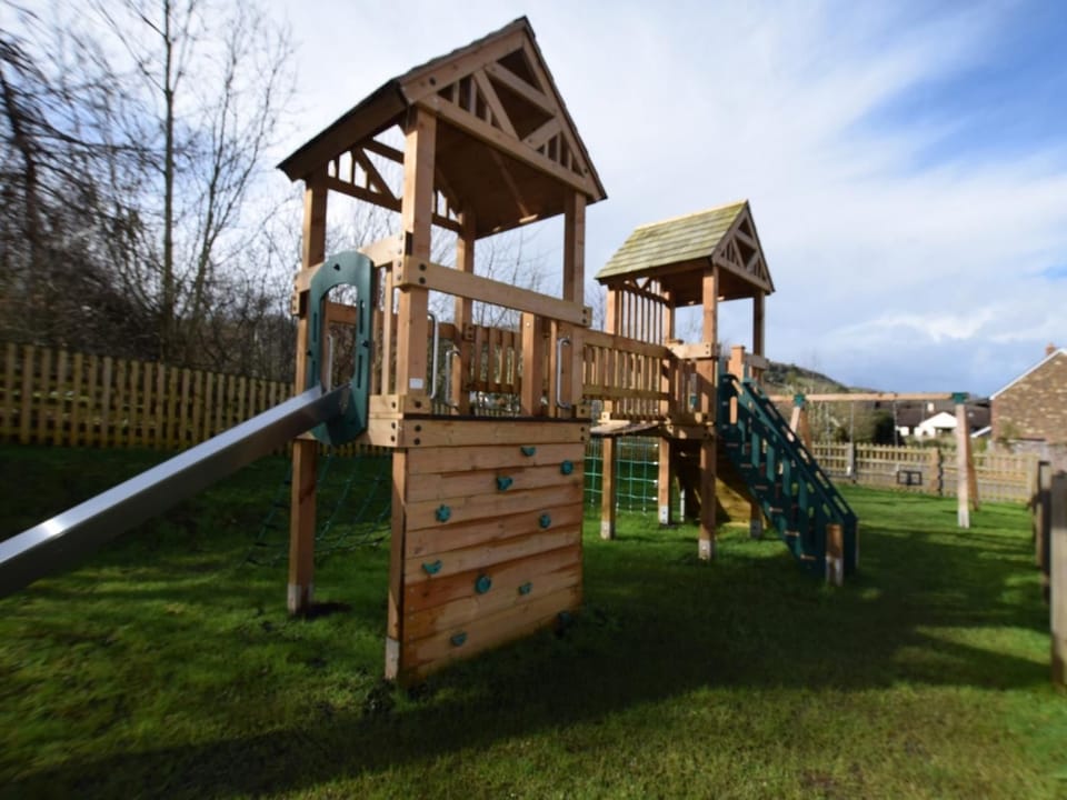 Children's communal play area at the back of the property
