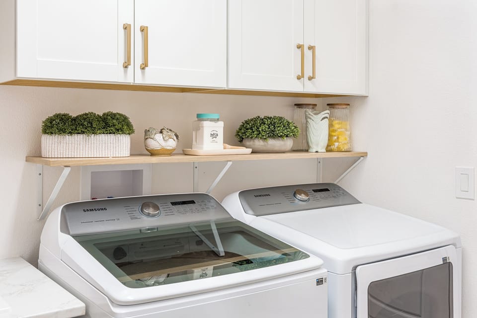 Laundry - Indoor Washer, Dryer & Utility Sink.