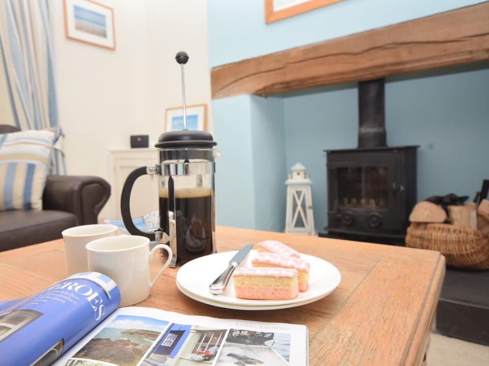 Enjoy a coffee in front of the woodburner 