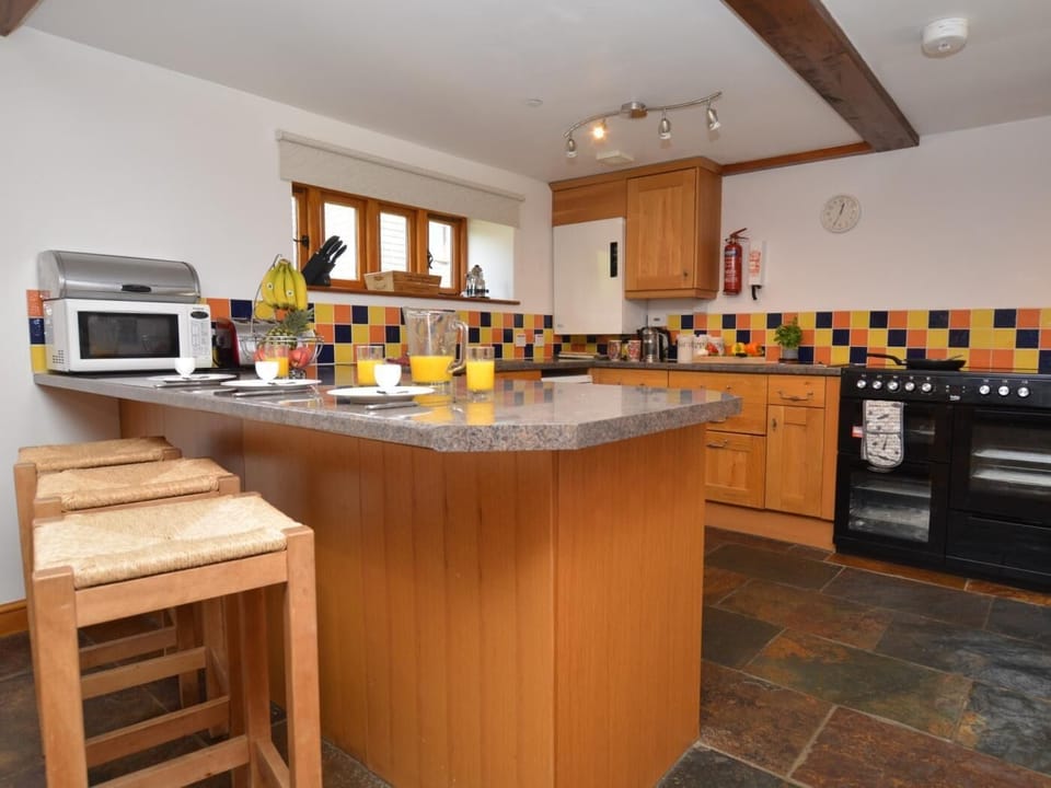 Kitchen area with a breakfast bar