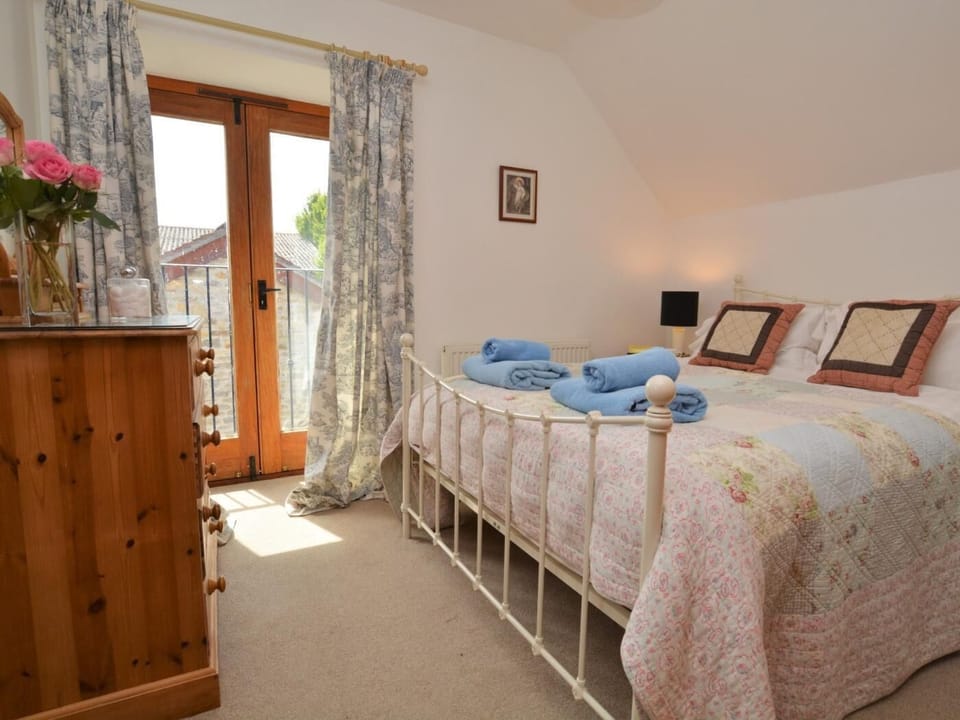 Double bedroom with a Juliette balcony and en-suite bathroom