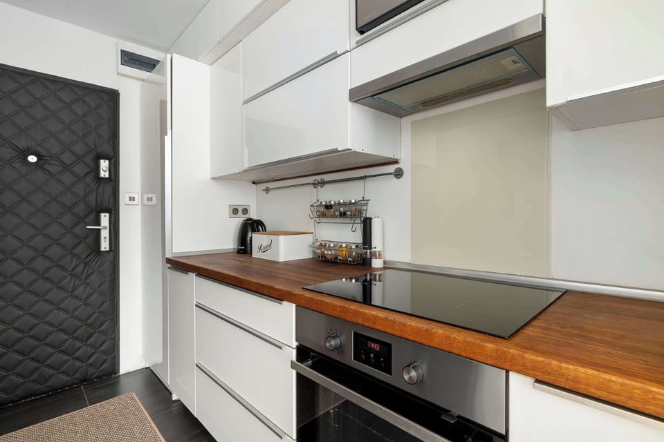 The fully equipped kitchenette includes everything you need for a home-cooked meal.