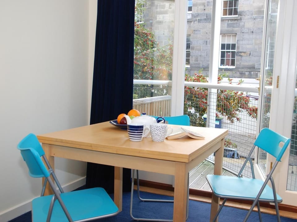 Dining area with patio doors to balcony