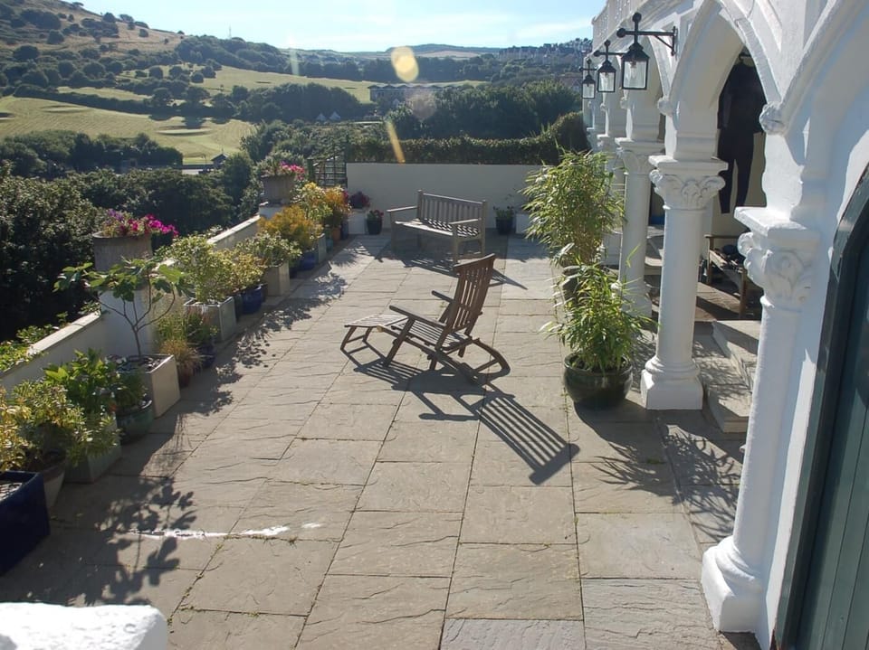 Relax on the private terrace and enjoy the sea views