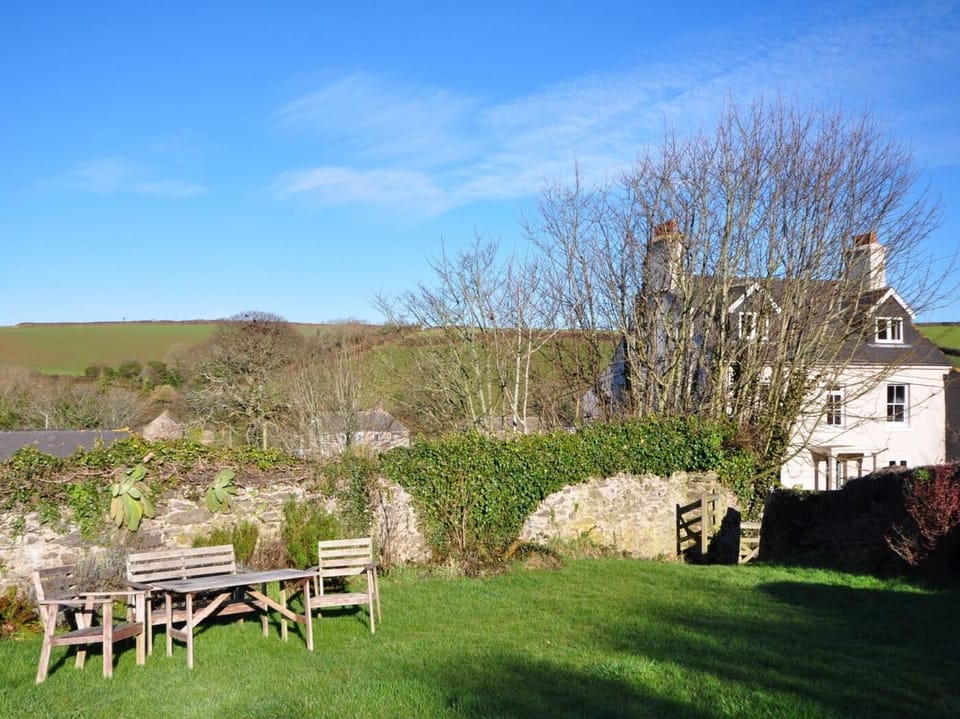 Relax and unwind in the shared garden with seating