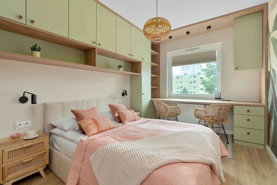 A cozy bedroom with a comfortable double bed and natural light. Soft colors create the perfect setting for a restful night's sleep.