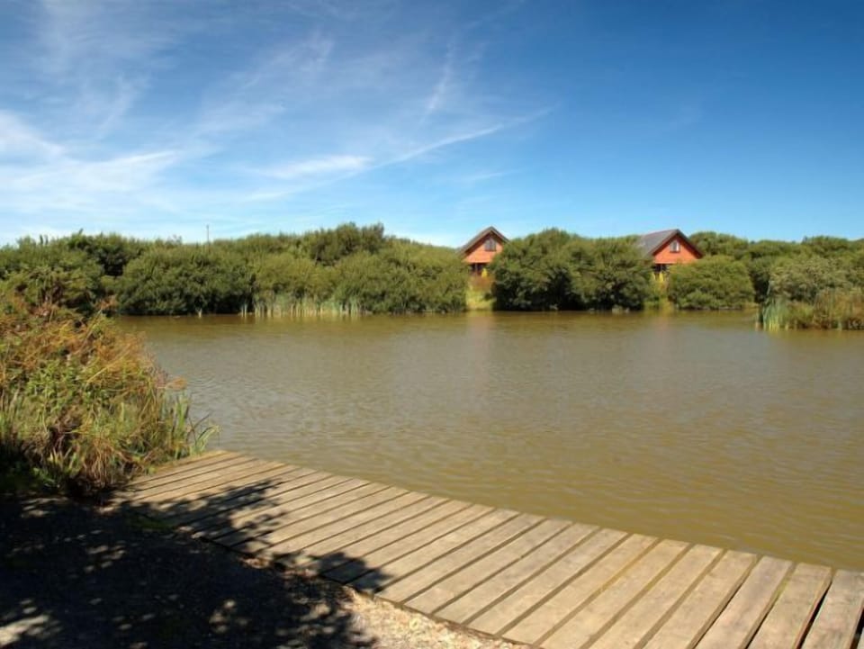 Views of lodges across a lake