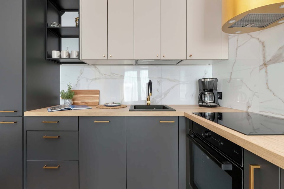 A stylish kitchenette with everything you need for cooking. Functional design and modern finishes make meal preparation easy.