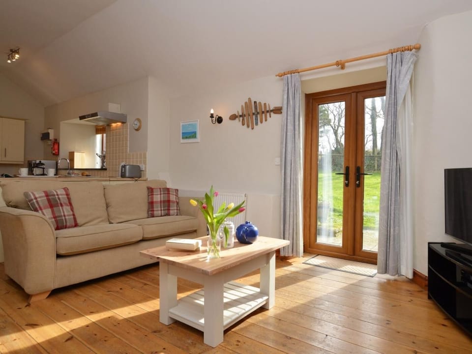 Delightful lounge area with French doors to the large garden