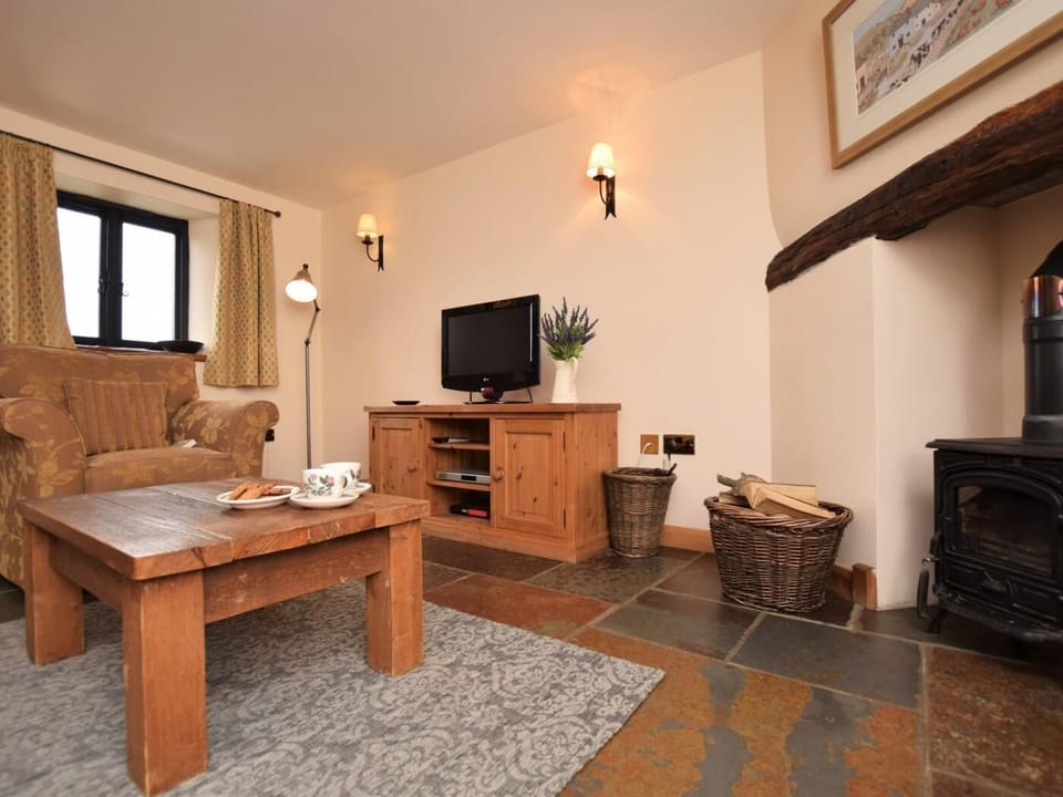 Lounge area wtih gorgeous wood burner