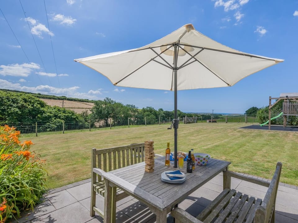 Enjoy the distant sea views and watch the children play 