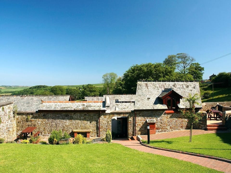 View towards the property with enclosed walled garden