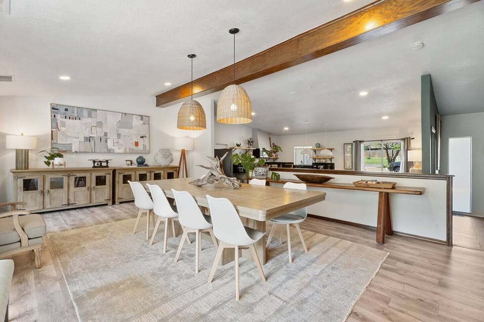 Relax in a spacious living area with stunning garden views. A cozy space to enjoy and unwind.