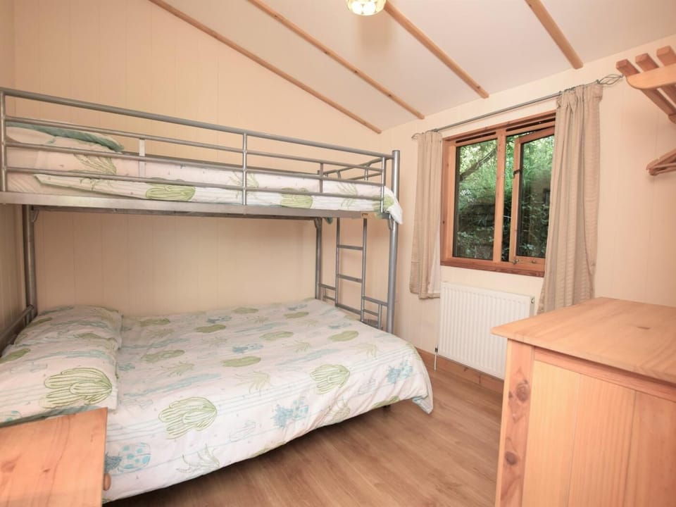 Bedroom with triple bunk