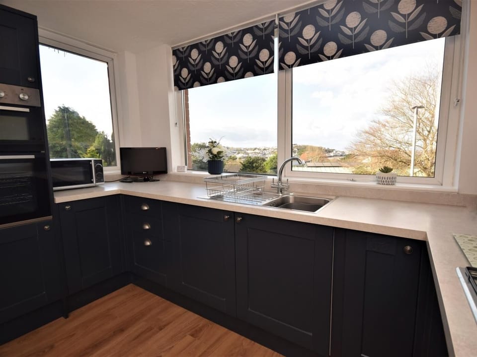 Kitchen/diner with views of the estuary and Appledore