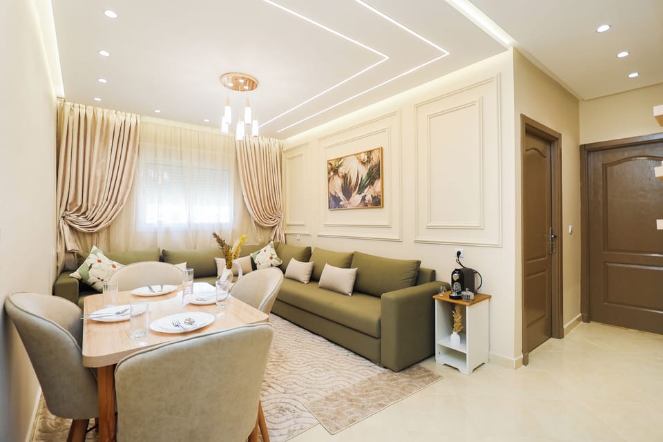 Comfort Apartment | Living area | 50-inch Smart TV with cable channels
