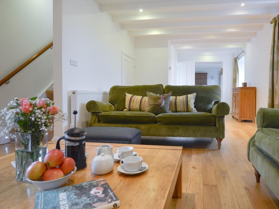 Beautiful stylish velvet sofas complement the space