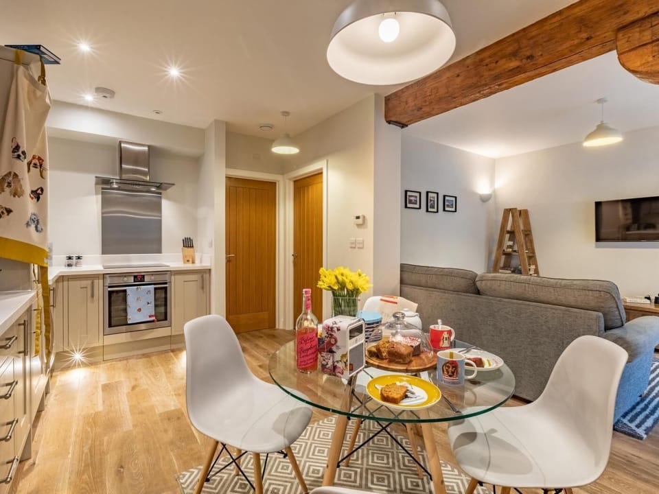 Original beams add to the charm in the living space