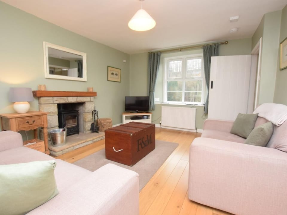 Lounge with cosy wood burner