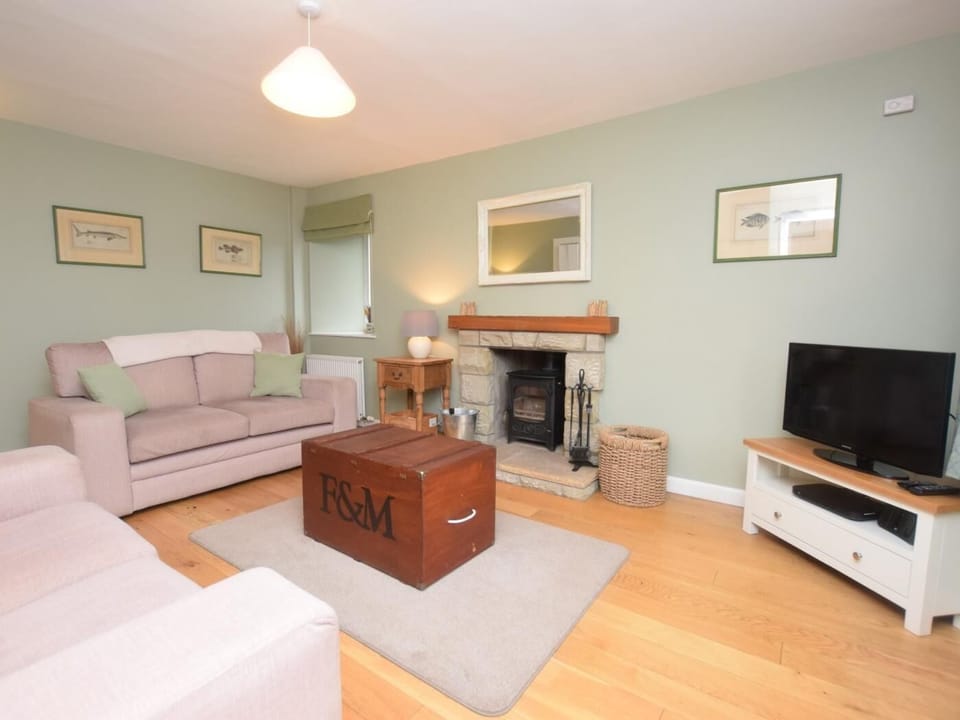 Lounge with cosy wood burner