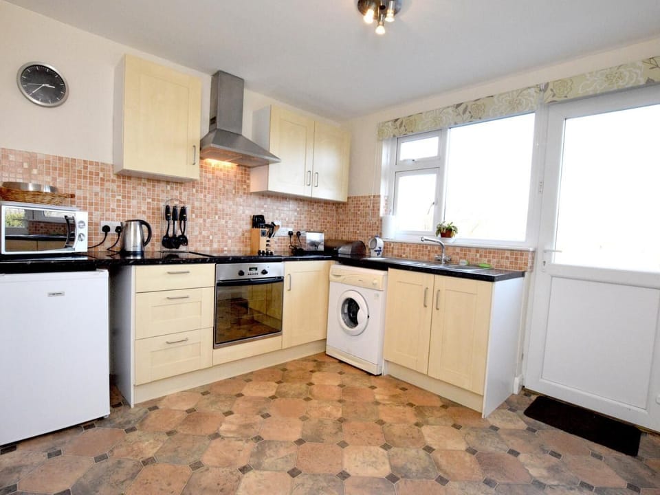 The kitchen is spacious and well equipped