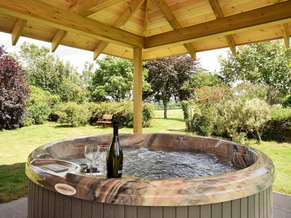 Undercover hot tub with beautiful views