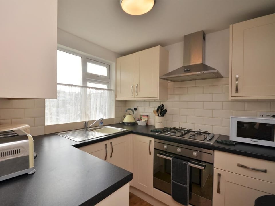 A fully equipped kitchen area