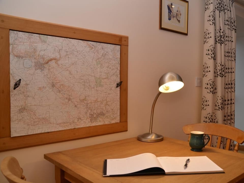 Catch up with your emails at the writing desk or table