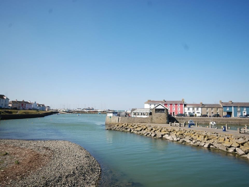 Explore Aberaeron with its array of shops and cafes