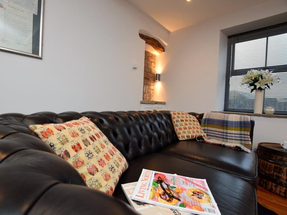 Relax in the cosy lounge with comfortable sofa