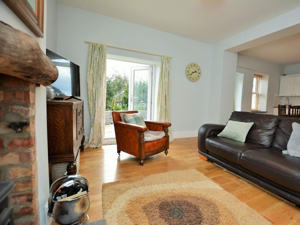 Natural light floods the open plan lounge/kitchen/diner