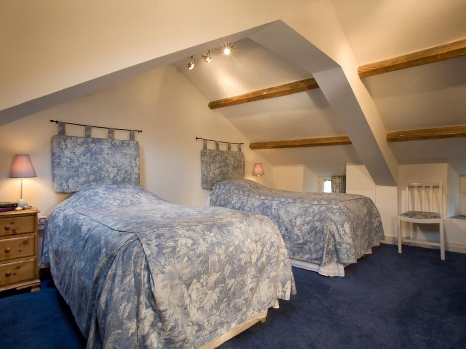 Twin bedroom with restricted height