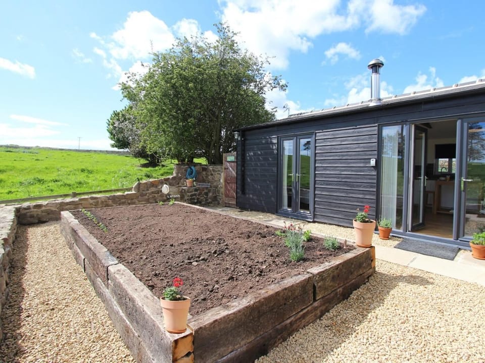 The private garden area offers tranquil rural views 