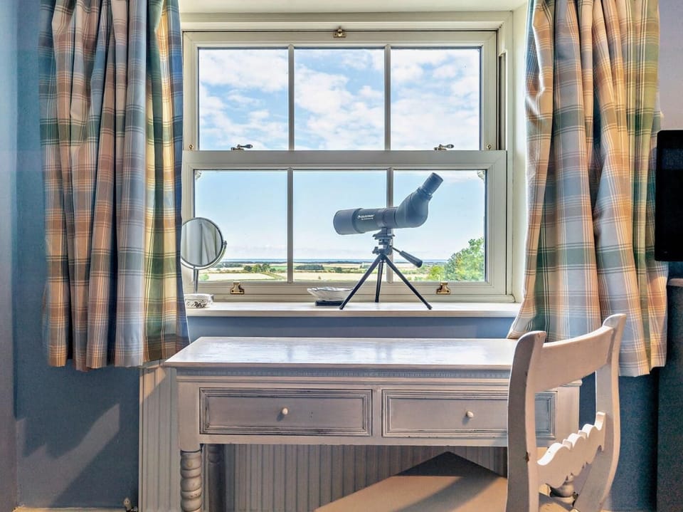 Use the spotting scope to take in the magnificent views of the area