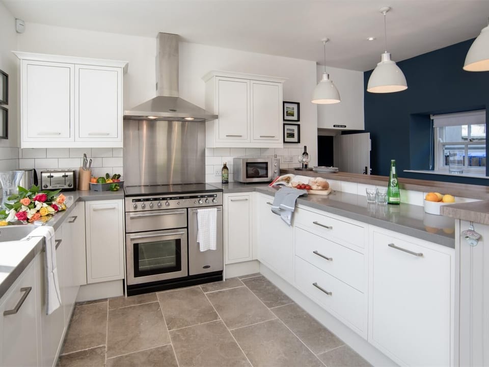 Prepare a meal in the beautiful, contemporary kitchen 