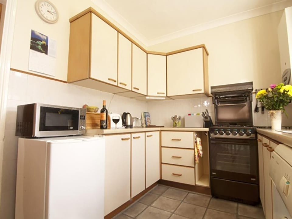 Prepare a meal in the well equipped kitchen