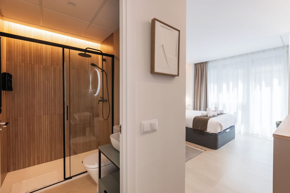 Standard Studio | Bathroom | Shower, hair dryer, towels, soap
