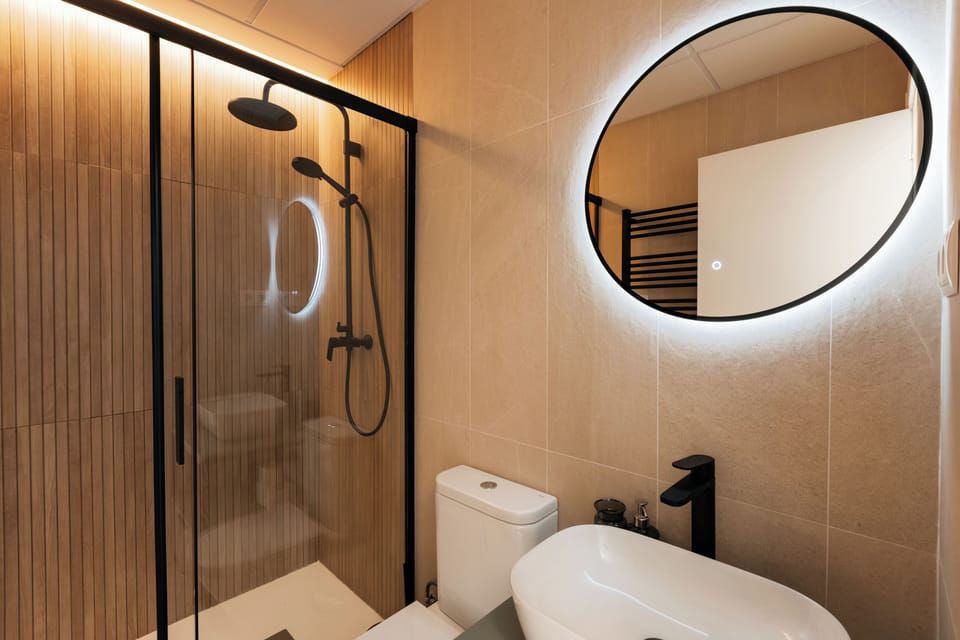 Standard Studio | Bathroom | Shower, hair dryer, towels, soap