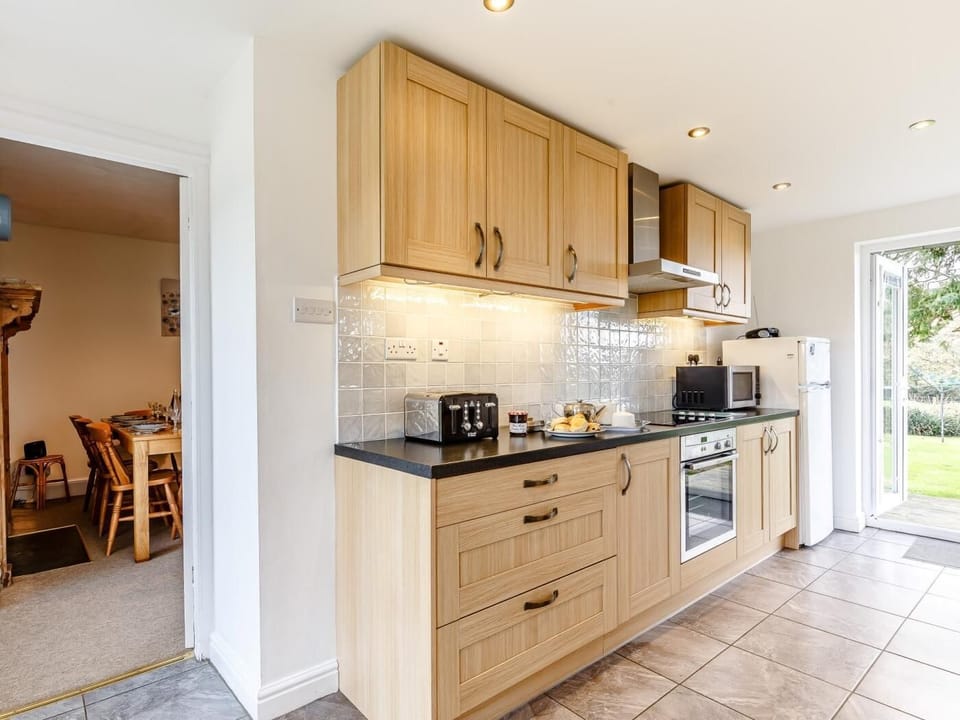 The kitchen also leads straight into the dining room
