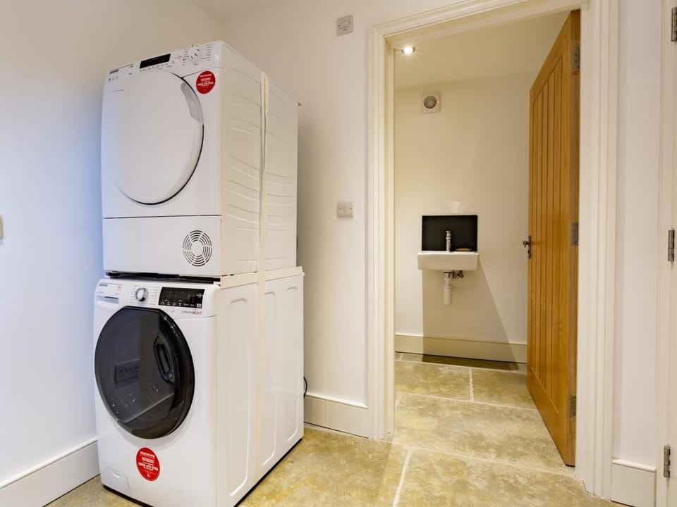 Utility room with downstairs WC