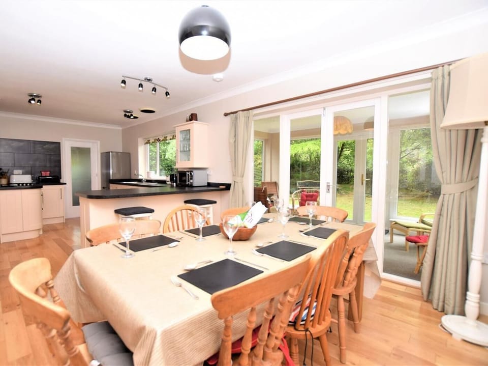 Spacious Kitchen/dining area leading to the sun room