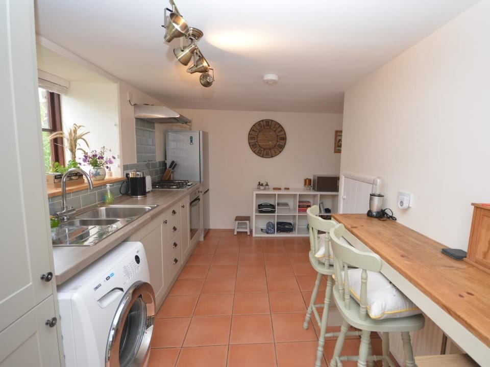 Kitchen with extra breakfast bar